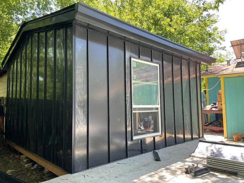 Black standing seam metal wall panels for Metal Roof Installation in Laconia