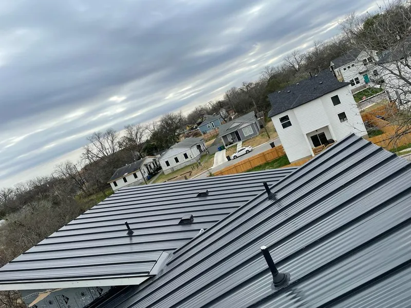 Standing seam metal roof panels with vents for Skylight Repair in Laconia